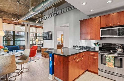 Old West Broad Neighborhood Condo | 2 Bed/2 Bath Mid-Century Modern Condo Loft, Historic Savannah. Walk everywhere!