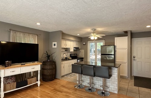 High Point House | Humble Hideaway - Inviting lakefront home with firepit, balcony & W/D - dog-friendly